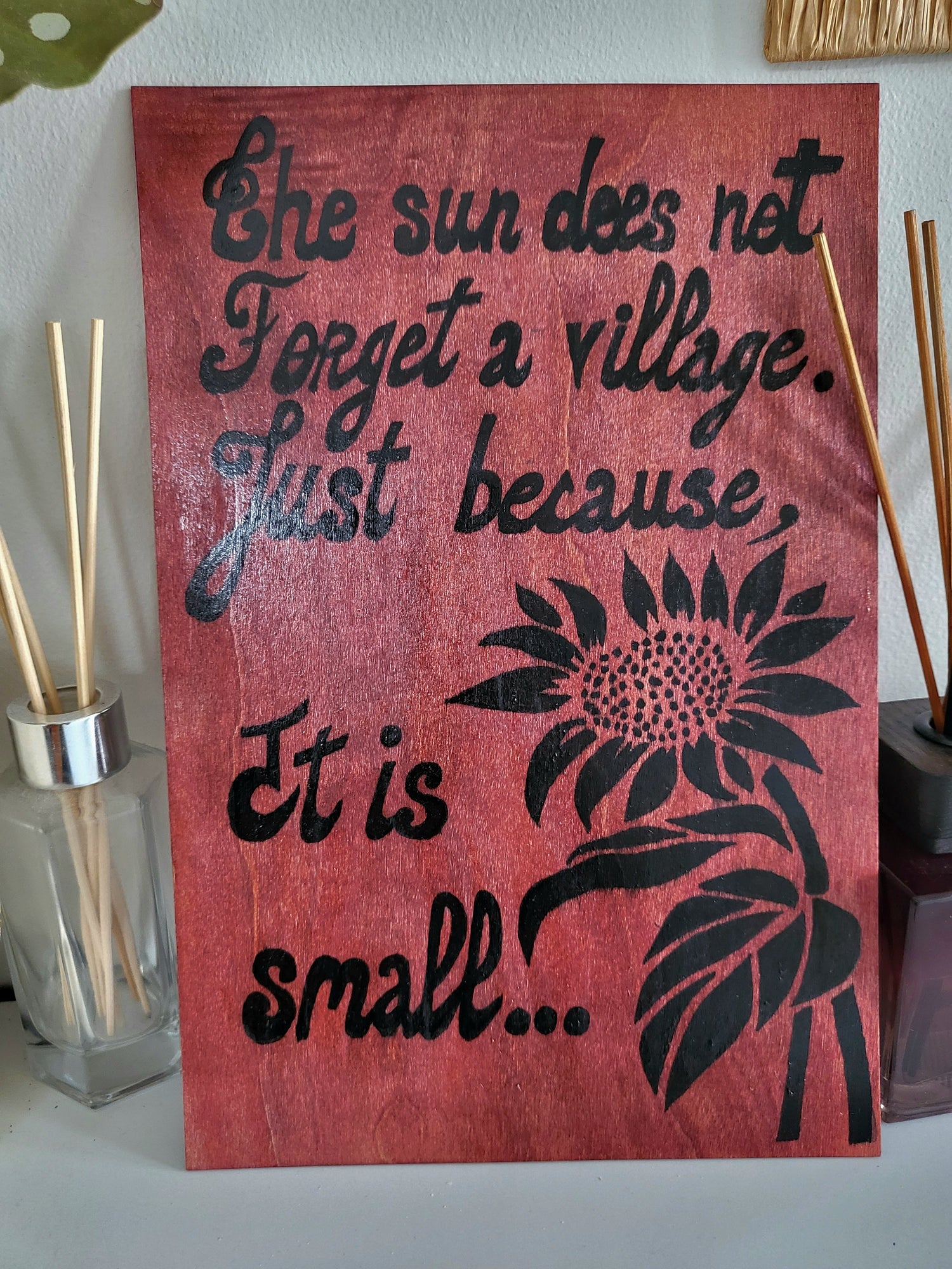 Red mahogany wood Art wall "The sun does not forget a village. Just because It is small.."