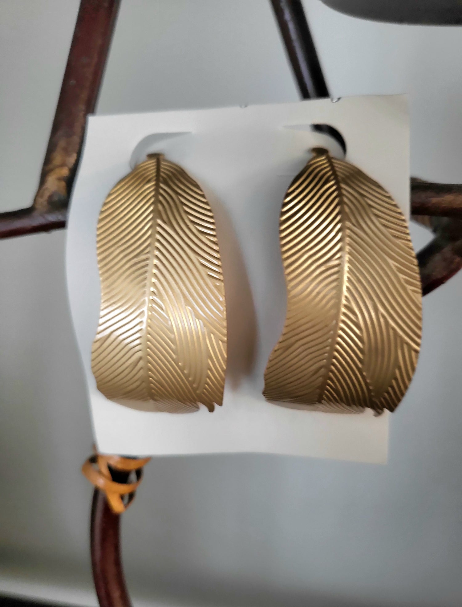Large golden leaf earrings