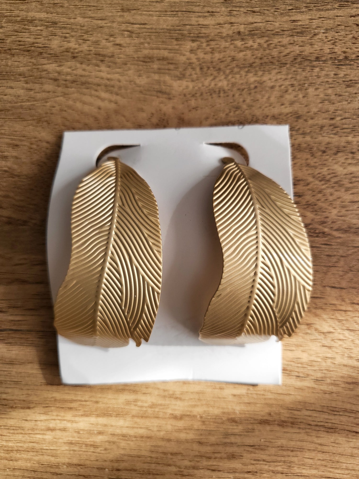 Large golden leaf earrings
