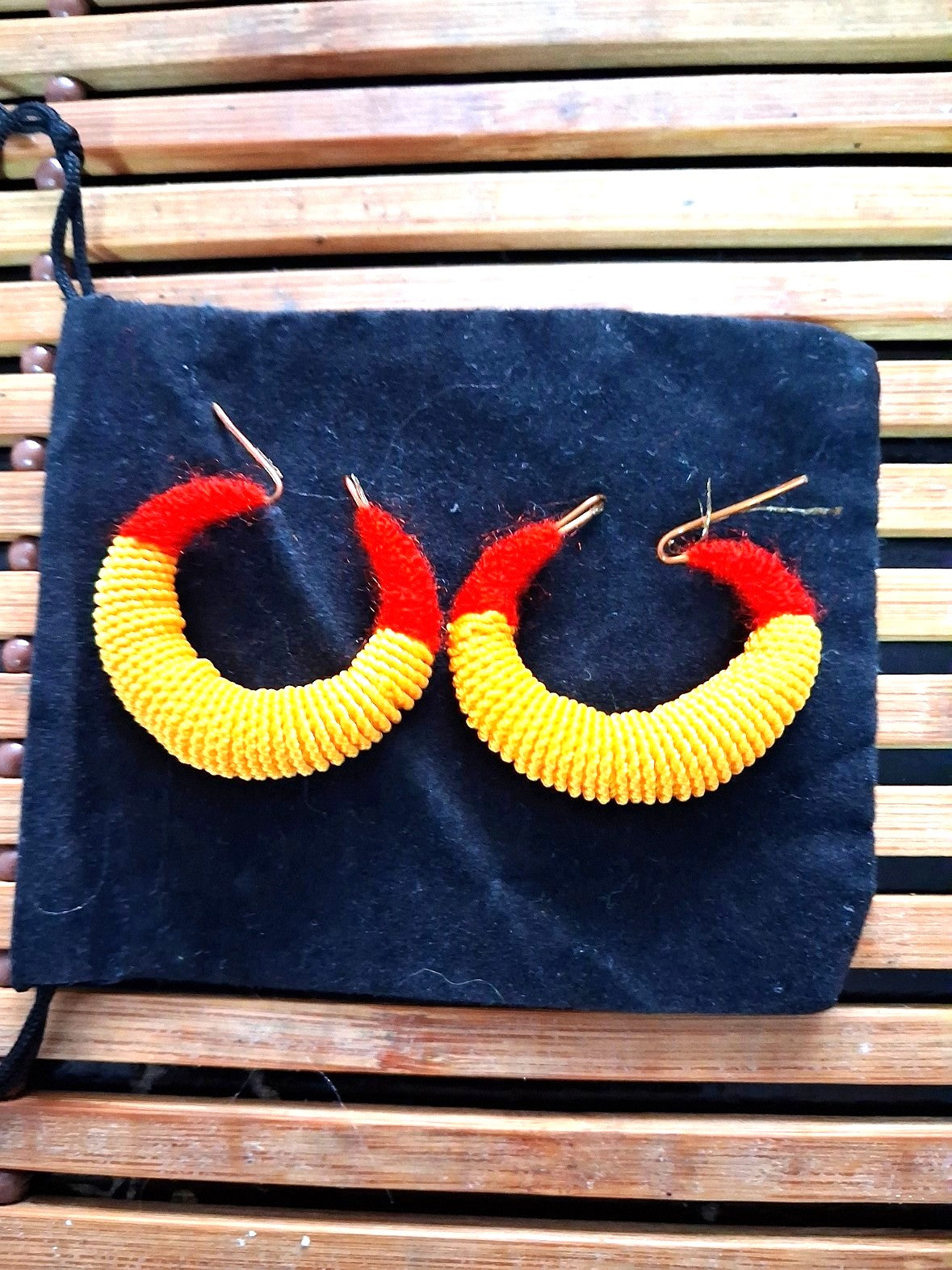 Medium traditional red and yellow Malian thread earrings