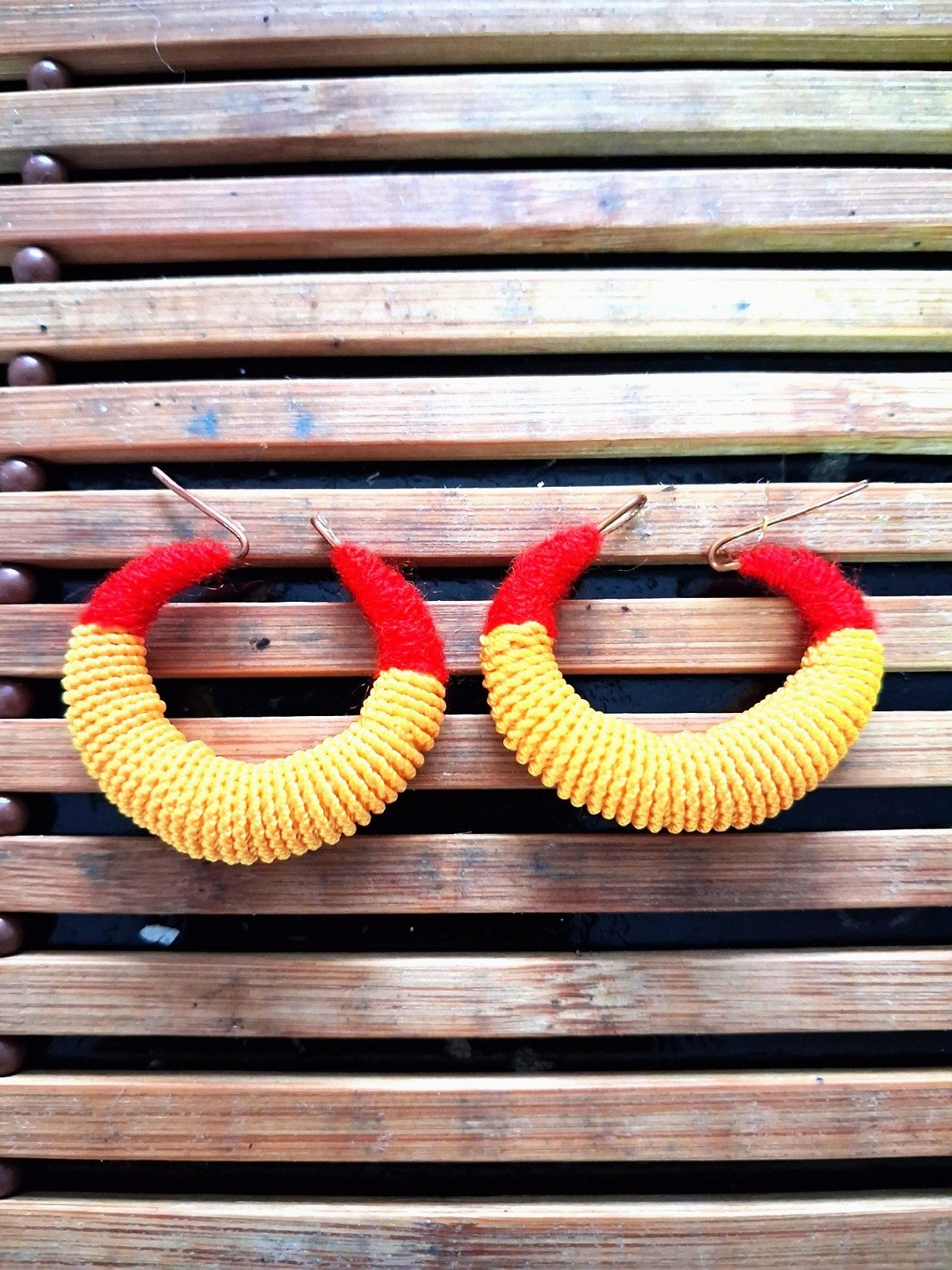 Medium traditional red and yellow Malian thread earrings